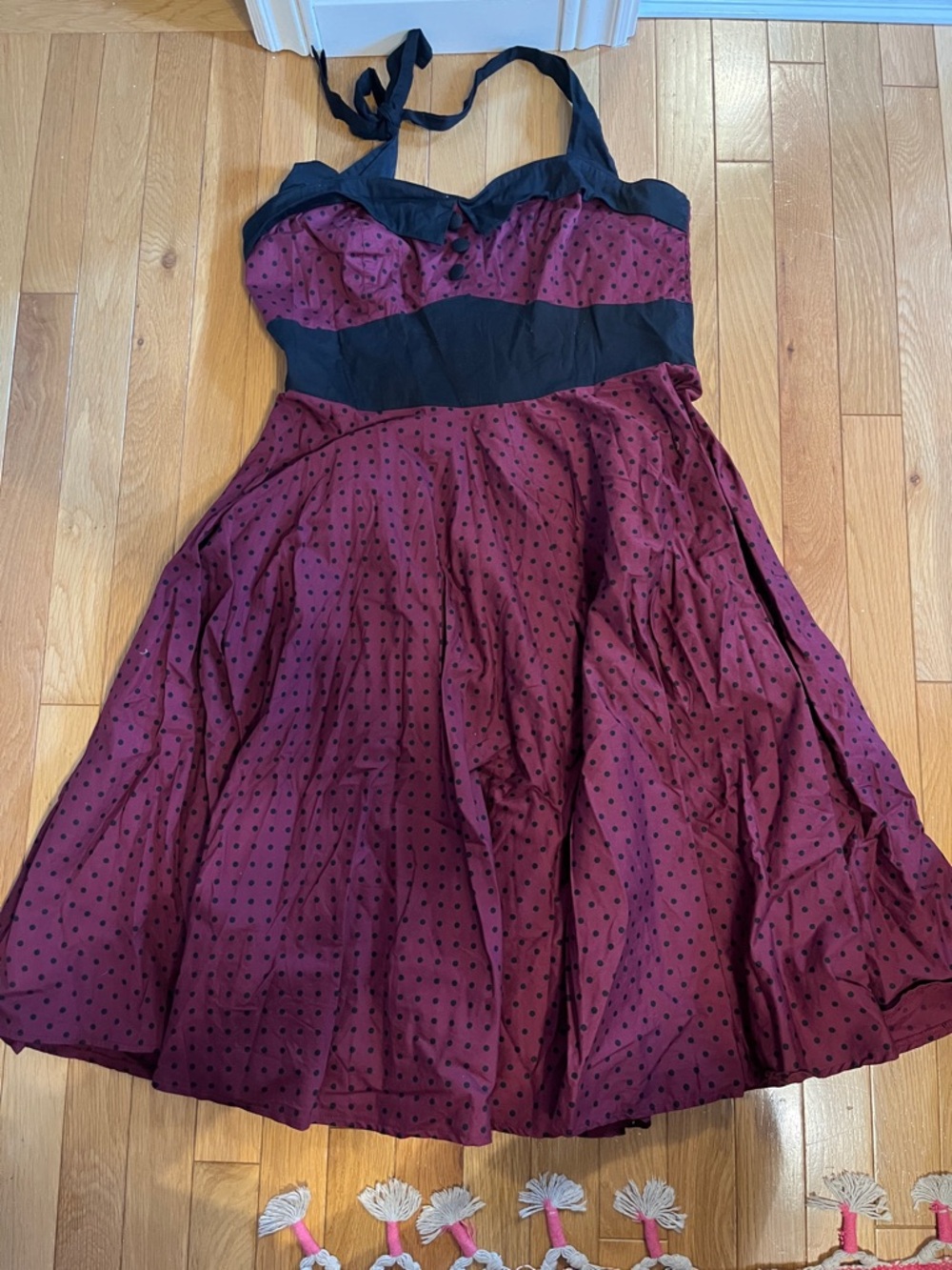 Vintage-Inspired Burgundy Polka Dot Midi Dress with Black Accents